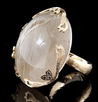 Anello in oro rosa con quarzo rutilato e diamanti